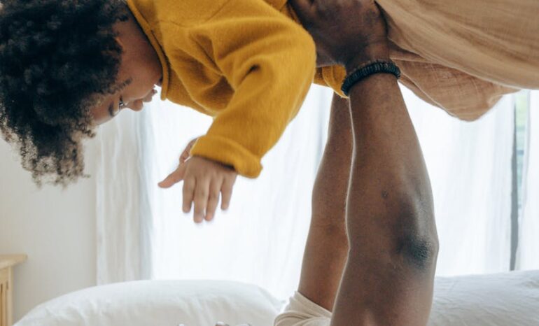 THE HEALING TOUCH OF THE PRESENT BLACK DAD.